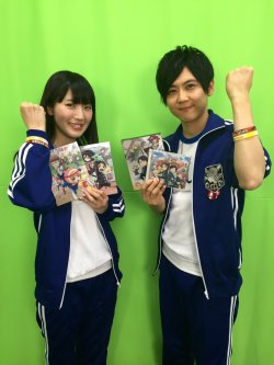 Kaji Yuuki (Eren) and Ishikawa Yui (Mikasa) pose in athletic