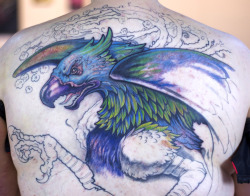 gravenimagetattoo:  Sandy’s Gryphon backpiece in progress….