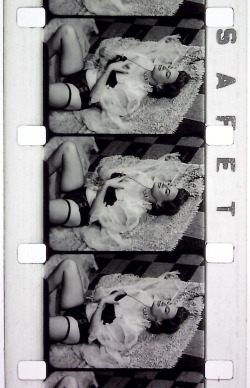 Cherrie Knight is featured in frames from an 8mm Burlesque short,