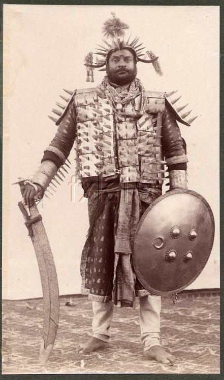 Portrait of an Indian State Executioner wearing full armour,