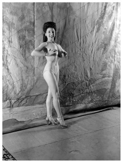 Rita Cortes poses Backstage at the &lsquo;El Capitan Theatre&rsquo; in Los Angeles..  From a photoshoot conducted by photographer Milton Lewis, in 1948..