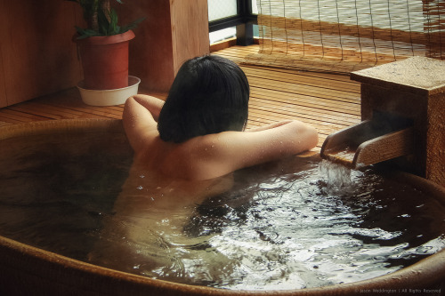Japanese woman in onsen, by Jason Weddington.