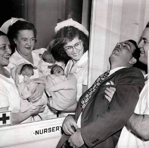 blessedimagesblog:Nurses show triplets to the father who passes