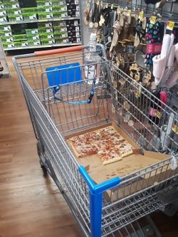 abandonedandurbex:Abandoned pizza and vodka in a Walmart shoe
