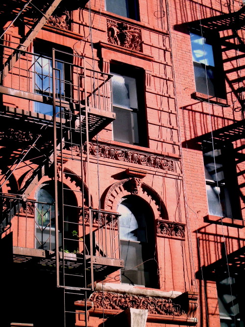 wanderingnewyork:Windows and shadows in Greenwich Village, Manhattan.
