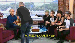 dimplelashton:  Michael getting a bit too excited over pizza