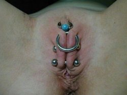 pussymodsgaloreShe has a hairless pussy with a HCH piercing with