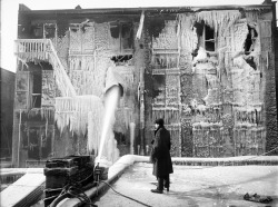 Frozen fire-fighter water on a burnt building, New York, 1920’s.