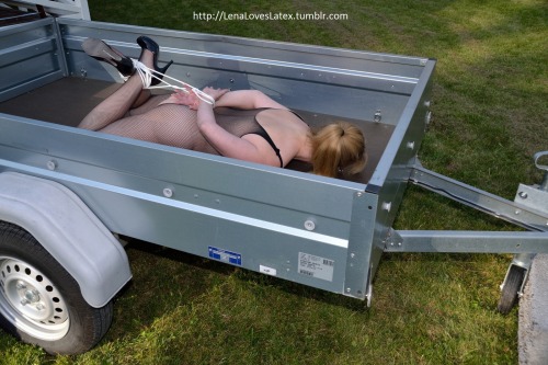 lenaloveslatex:  Lena hogtied in the trailer.  Nice hogtie in the outdoors!