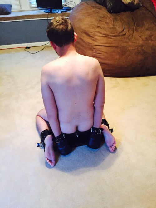 kinkythingsilike:  temptingdominance:  padlock86:  Had a little fun on the boiseat this morning.    Isn’t he adorable all locked up?  I want one. A boy and a boy seat. 