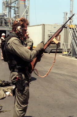 house-of-gnar:  house-of-gnar:  A US Navy SEAL checks out his