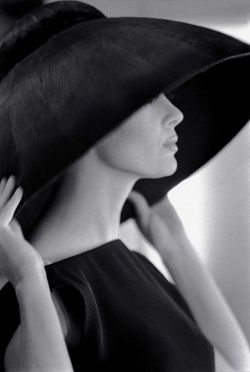   Model Jean Newington wearing a Yves Saint Laurent hat, 1962.