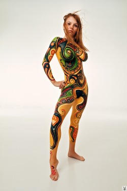 the60sbazaar:Michelle Angelo poses as body art for Playboy magazine