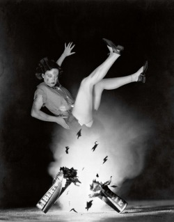 Joan Crawford being blown into the air by an exploding firecracker,