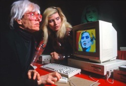 In 1985, Andy Warhol who was intrigued by the potential of computer-assisted