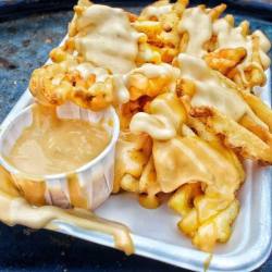 yummyfoooooood:Cheesy Waffle Fries with Cheese Sauce