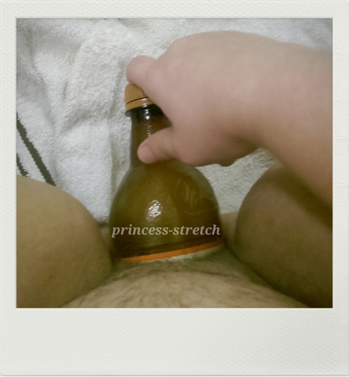 princess-stretch:  I realized that I had a spare 16 oz bottle lying around and wanted to see if I could use it and, after using my glass plug, I was able to do it! I felt so stretched and full when I fucked my loose cunt with it. I can’t wait to do