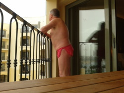 On a balcony of the Hilton, Malta, 30 November 2014. Short shorts