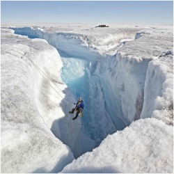 Frozen courage (camerawoman Justine Evans descends into a moulin,