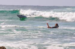 Soaking with the locals (surfer at Byron Bay, NSW, Australia)