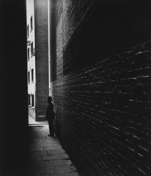 Bill Brandt - Policeman in a Dockland Alley, Bermondsey, 1934.