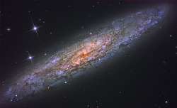 amazinguniverses:  NGC 253: Dusty Island Universe  