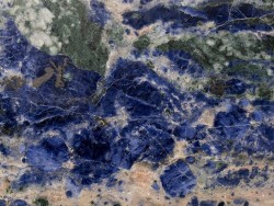 ifuckingloveminerals:  Sodalite, Aegirine, Cancrinite  Ice River