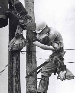 jonlittlebear:    The Kiss Of Life - A utility worker giving