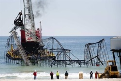 destroyed-and-abandoned:  A roller coaster that was plunged into