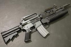 bearzard:  An XM177 with an m203 and carbine length heat shield