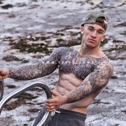 island guys with tattoos