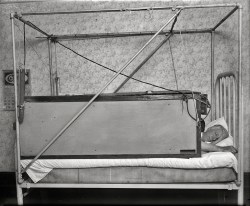 Washington man sleeps in a blanketless bed, 1927. Milton Fairchild