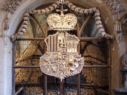 Time for another All Hallow’s Eve excursion … to the Sedlec Ossuary in Kutná Hora, Czech Republic. Quaint but unassuming from the exterior, it completely captives the imagination upon descending into the chapel. Constructed in the 1870s (and