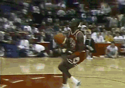  Michael Jordan takes off from the free-throw line 