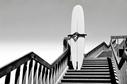 onlyoldphotography: Dennis Stock: Man holding a surfboard on