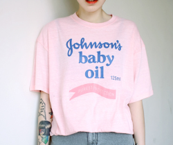 littlealienproducts:  Johnson’s Baby Oil Tee sold by UZIPbabyoilgirl
