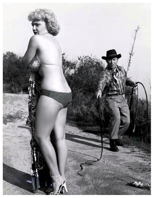 burleskateer: WHIP TEASE Jennie Lee appears in the pages of the December ‘54 issue of ‘TAB’; a popular Men’s Digest.. She’s shown losing various articles of her clothing from a 15-foot bullwhip wielded by expert handler: Dave Kashner.. 