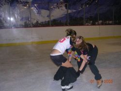 pantsing-love:  Girl getting pantsed by friend in at the ice