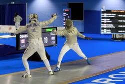 modernfencing:  [ID: a sabre fencer parrying five as her opponent
