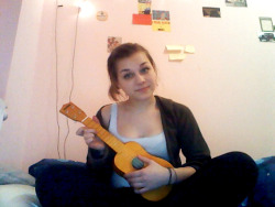 phraxpunk:  hi this is me and also hi this is my ukulele which