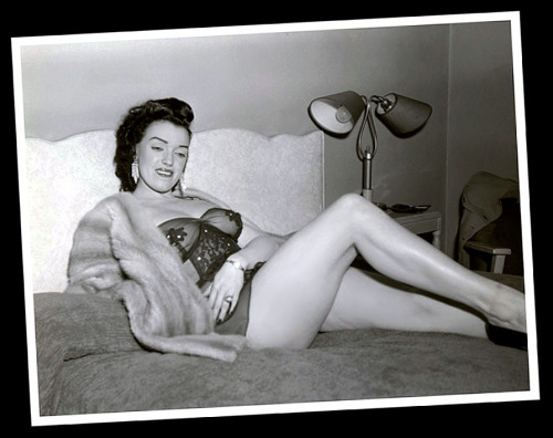 Ann Perri      aka. “The Jane Russell of Burlesk”.. An image from one of her Nudie-Cutie photo sets..