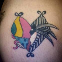 Recent tattoo of a Jack and Sally heartamajig.   Thank youu.