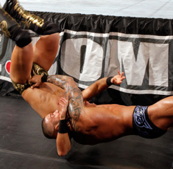 rwfan11:  Orton hooks the front of Miz’s trunks during suplex