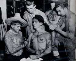 obi-kenobii:  Vintage photography of american tattoos.  The last