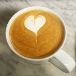 Large latte with whole milk.  Intelligentsia’s Black Cat