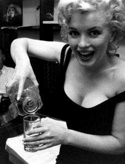 :  A rare photo of Marilyn at home c. 1958 © Robert Kelley.