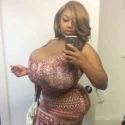 biggestboobguns:  Forget an hour glass figure.  She’s got