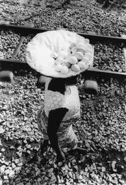 standingatthefence:Chester Higgins Jr. |  An Egg Vendor, Ghana 1974