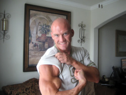 muscledlust:  Brett showing off that amazing biceps!