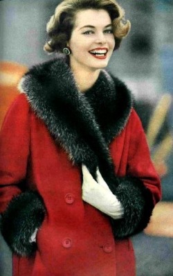 theniftyfifties:  Model wearing a fur trimmed red coat for Glamour